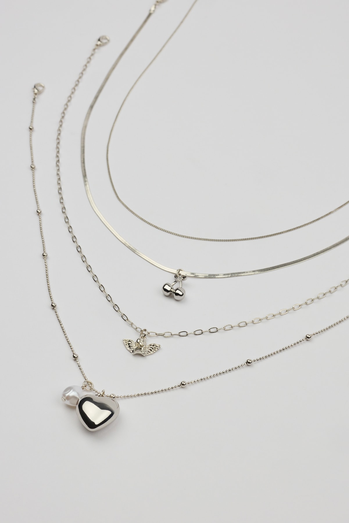 Set of 4 Angel and Cherry Pendant Necklaces - Image 4