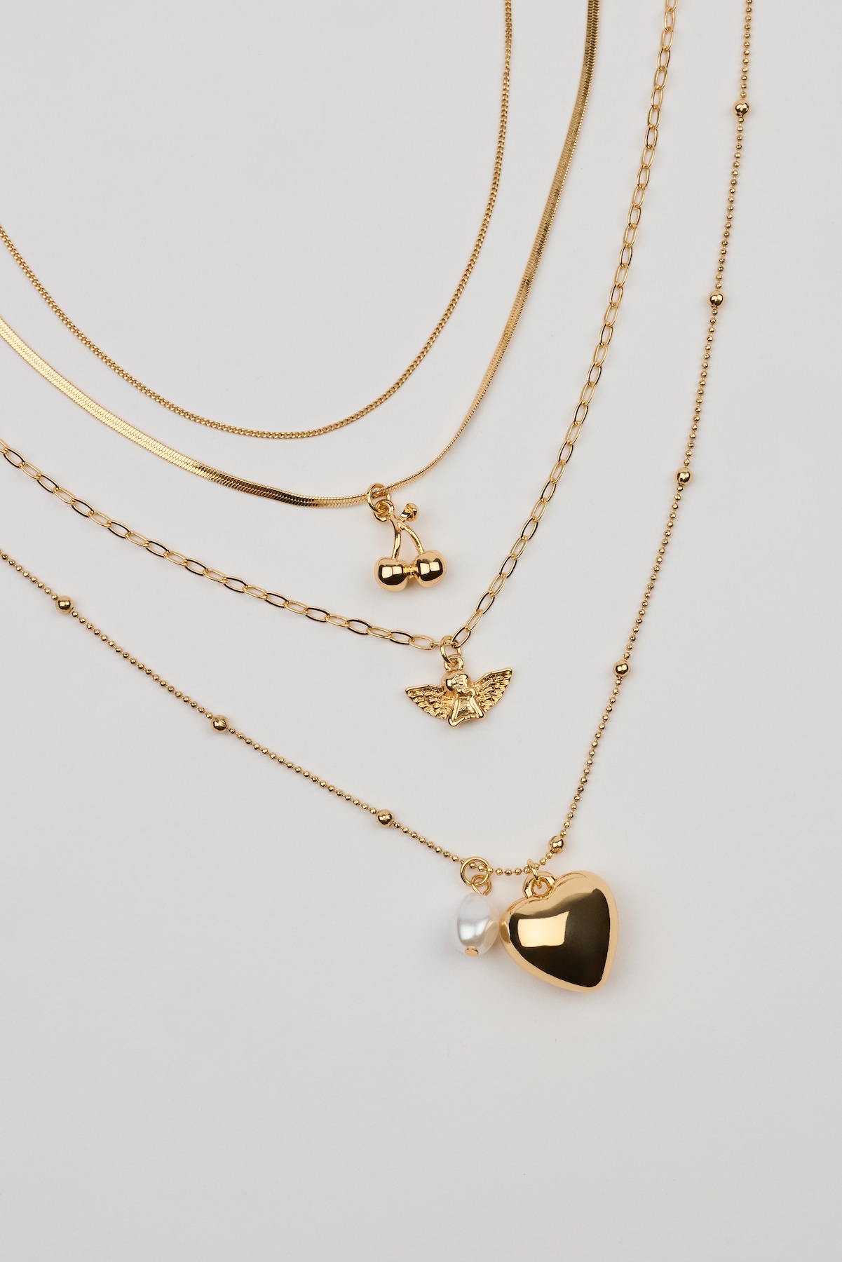 Set of 4 Angel and Cherry Pendant Necklaces - Image 3